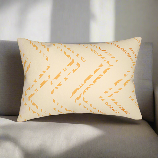 20"x14" rectangular shaped lumbar pillow with beige and orange print